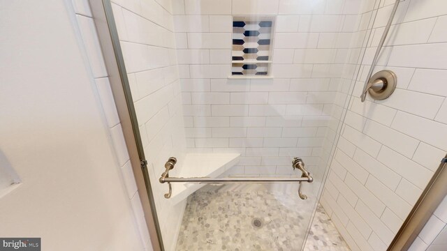 bathroom with an enclosed shower