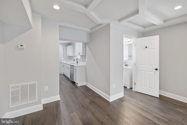 corridor featuring sink and dark wood-type flooring