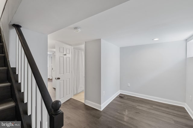 stairway with wood-type flooring