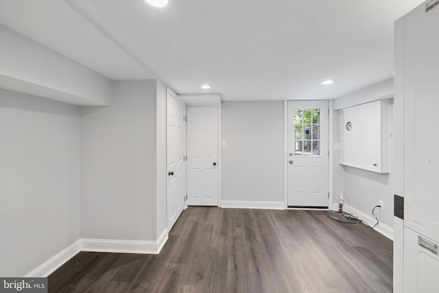 washroom with dark wood-type flooring