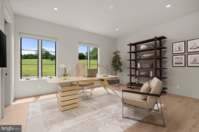 office area with light hardwood / wood-style flooring