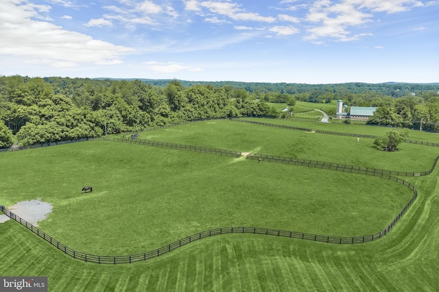 birds eye view of property featuring a rural view