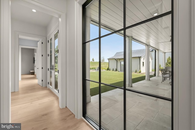 doorway featuring light hardwood / wood-style floors