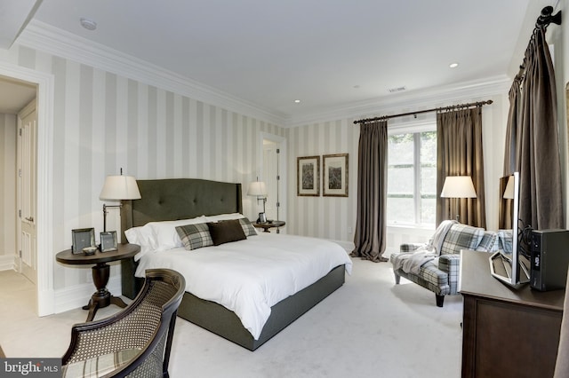 bedroom featuring crown molding and light colored carpet