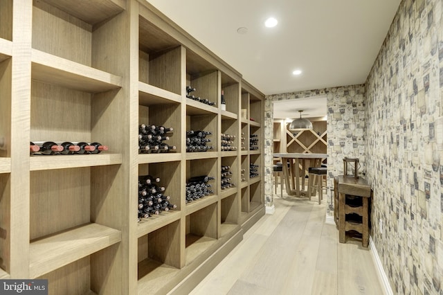 wine area featuring hardwood / wood-style flooring