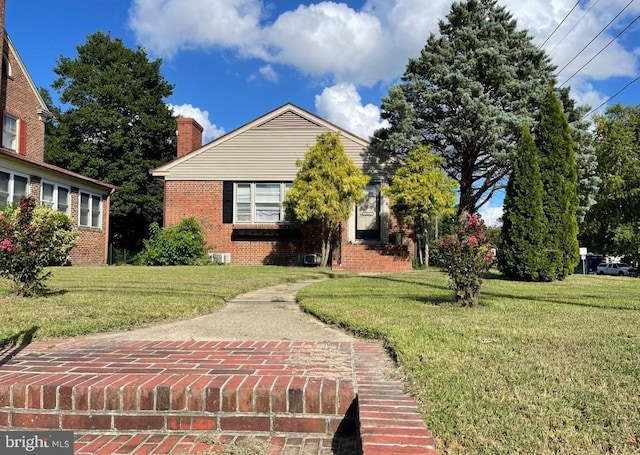 view of front of house with a front lawn