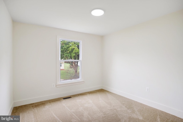 spare room with carpet flooring