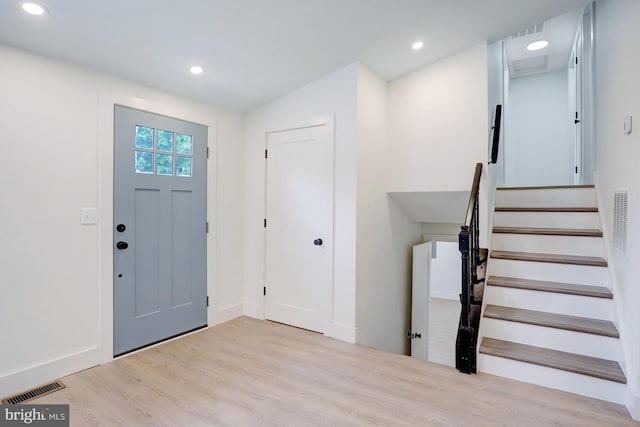 foyer with light hardwood / wood-style flooring