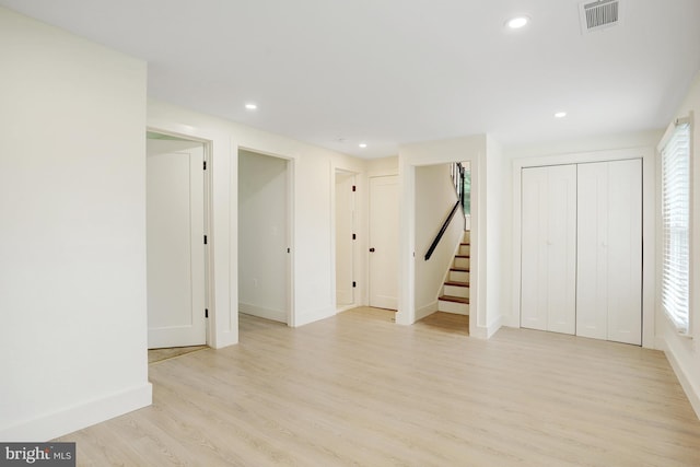 basement with light wood-type flooring