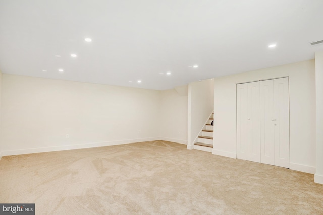 basement with light colored carpet