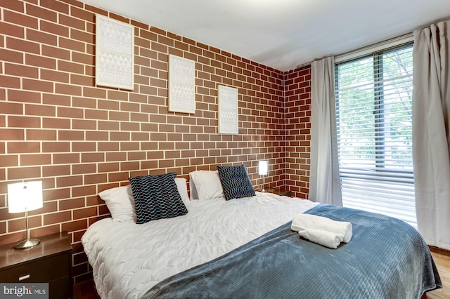 bedroom featuring wood-type flooring