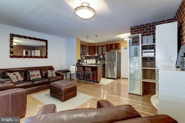 living room with light hardwood / wood-style floors