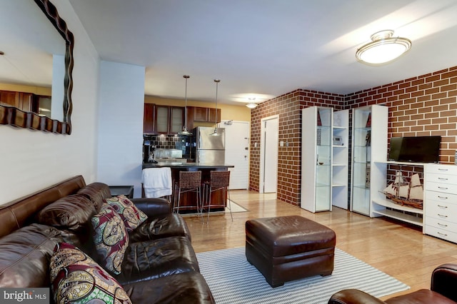 living room with light hardwood / wood-style flooring