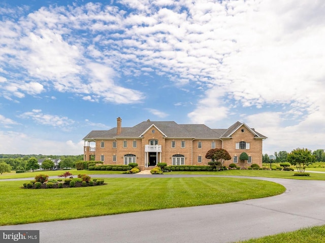 14950 Kelley Farm, Darnestown, MD 20874 - georgian-style home with a front yard, a chimney, and brick siding
