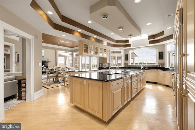 14950 Kelley Farm, Darnestown, MD 20874 - kitchen with dark countertops, cream cabinets, a raised ceiling, glass insert cabinets, and recessed lighting