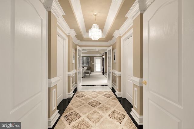14950 Kelley Farm, Darnestown, MD 20874 - corridor featuring a decorative wall, ornamental molding, a chandelier, a tray ceiling, and a wainscoted wall