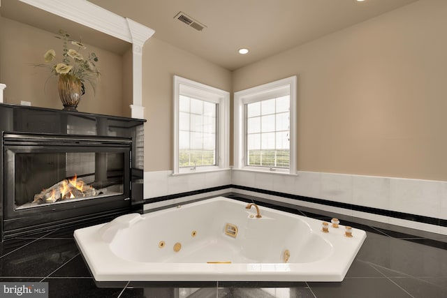 14950 Kelley Farm, Darnestown, MD 20874 - bathroom with a whirlpool tub, recessed lighting, and a glass covered fireplace