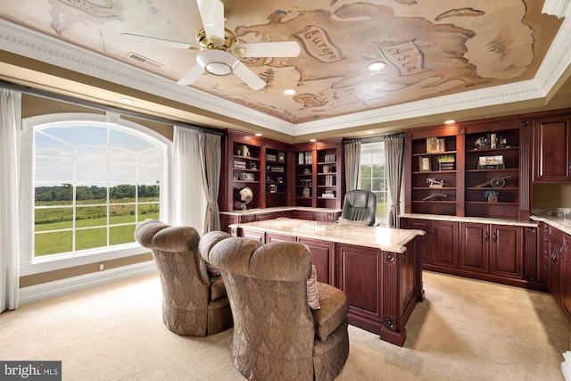 office area with light colored carpet, ceiling fan, and ornamental molding