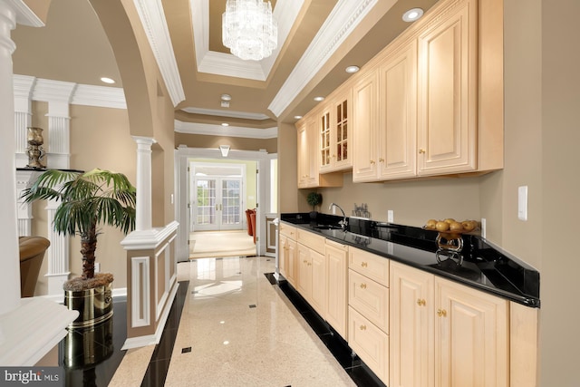 14950 Kelley Farm, Darnestown, MD 20874 - kitchen with crown molding, granite tiled floors, decorative columns, glass insert cabinets, and recessed lighting