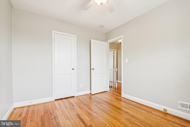 unfurnished bedroom with light hardwood / wood-style flooring and ceiling fan