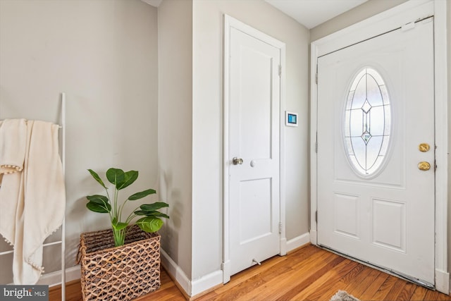 foyer with light wood-type flooring