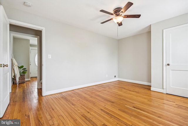 unfurnished bedroom with ceiling fan and light hardwood / wood-style flooring