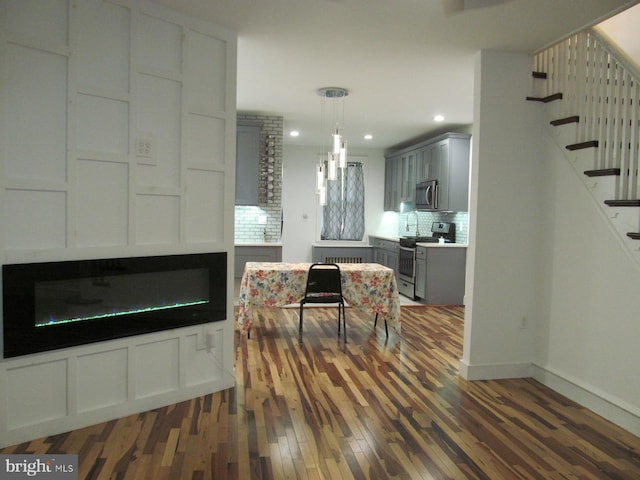 living room with dark wood-type flooring