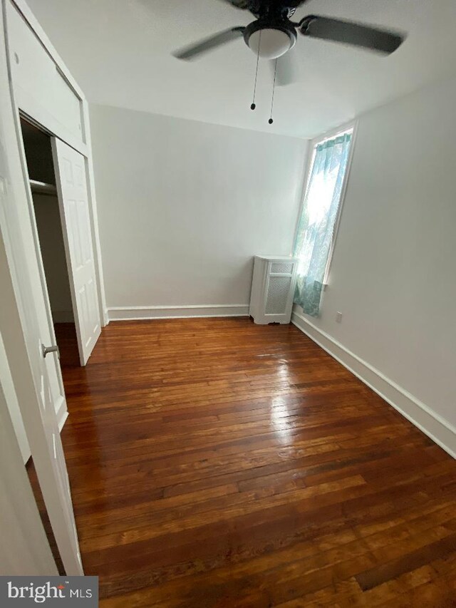 interior space with dark hardwood / wood-style floors