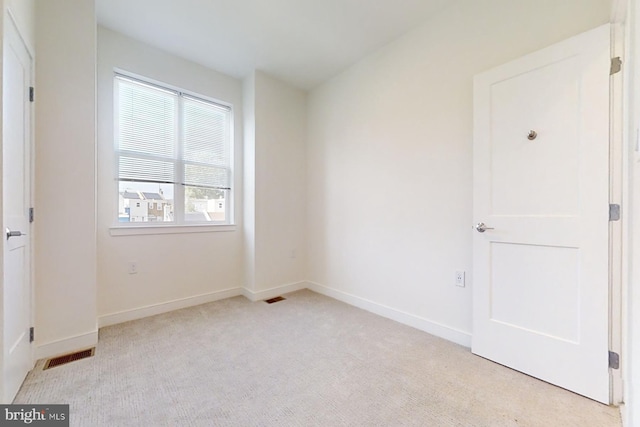 empty room with light carpet