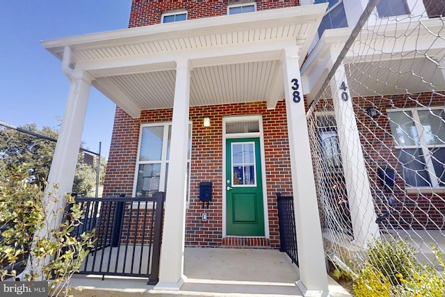 entrance to property with a porch