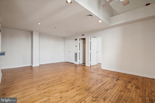 unfurnished room with light hardwood / wood-style flooring