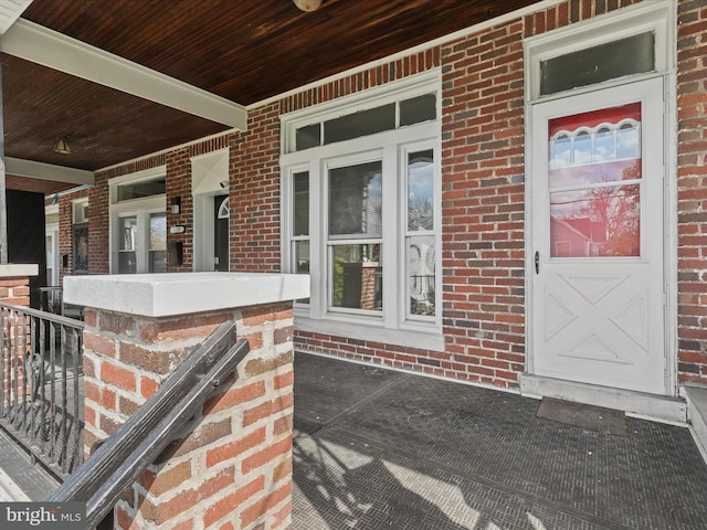 121 S Monastery Ave S, Baltimore, MD 21229 - view of exterior entry with brick siding and covered porch