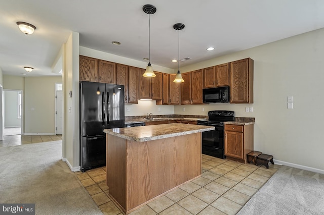 kitchen with light colored carpet, sink, black appliances, decorative light fixtures, and a center island