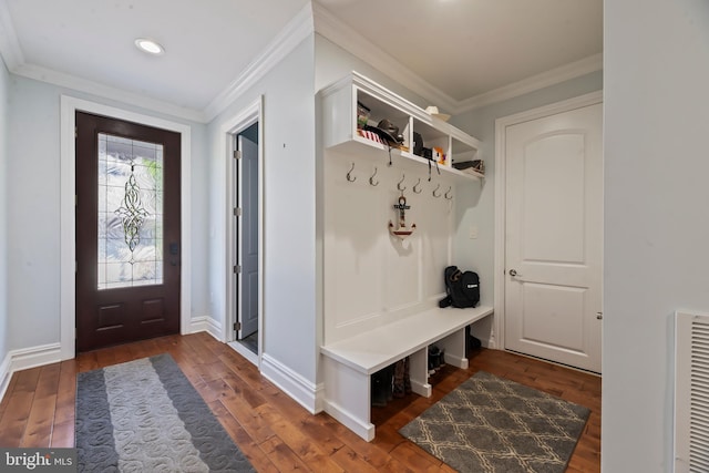 mudroom featuring dark wood-type flooring and ornamental molding