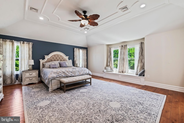 bedroom featuring dark hardwood / wood-style floors, vaulted ceiling, ceiling fan, and crown molding