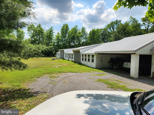 view of yard featuring a garage