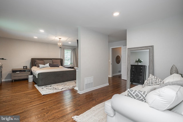 bedroom featuring dark hardwood / wood-style floors