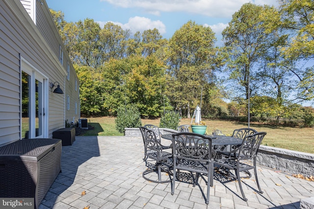 view of patio with central AC unit