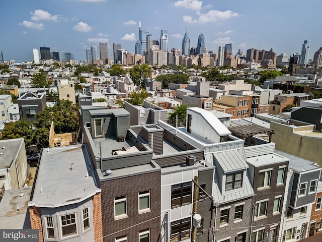 drone / aerial view featuring a city view