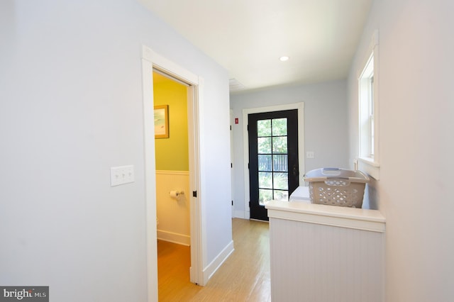 hallway with light wood-type flooring