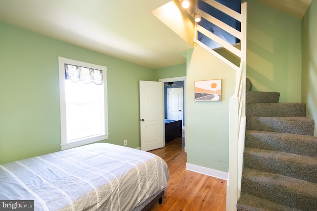 bedroom featuring hardwood / wood-style flooring