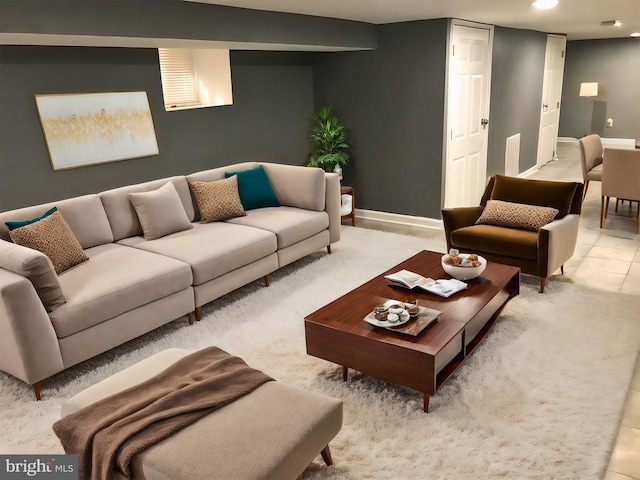 living room with light tile patterned floors