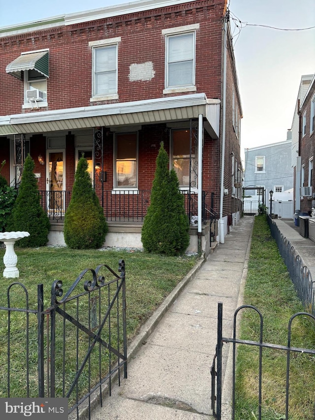 multi unit property featuring a porch