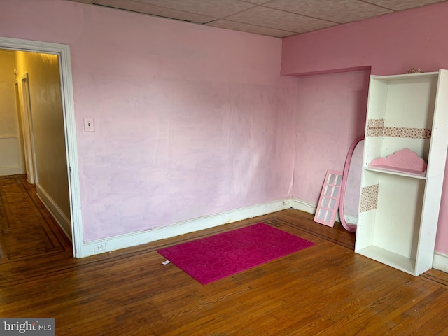 unfurnished room with dark hardwood / wood-style floors