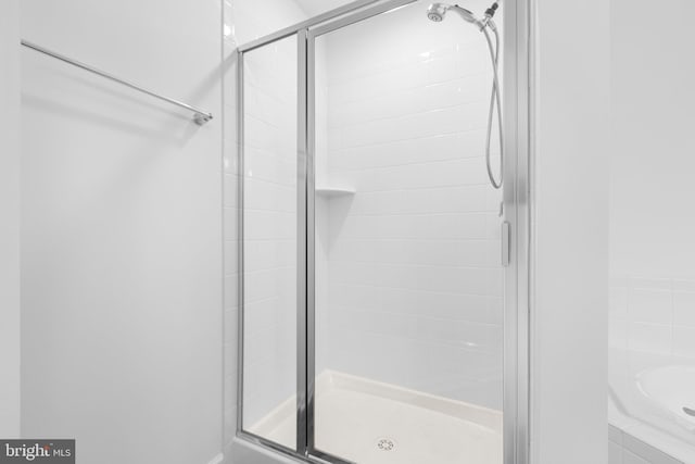 bathroom with independent shower and bath