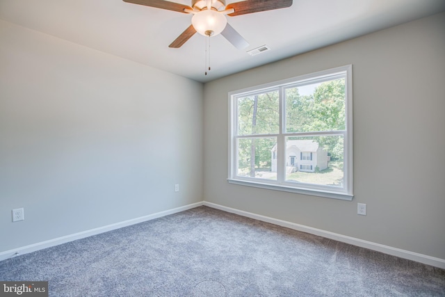 unfurnished room featuring carpet flooring and ceiling fan