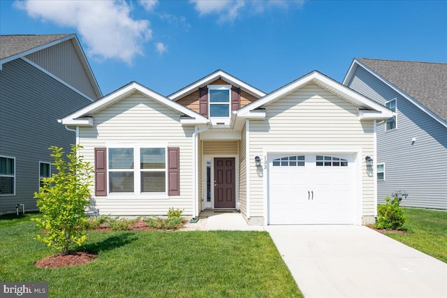 craftsman-style house featuring a garage and a front lawn