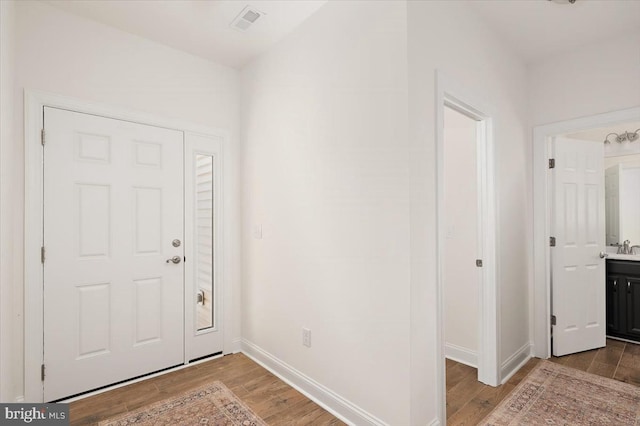 foyer entrance featuring light hardwood / wood-style flooring