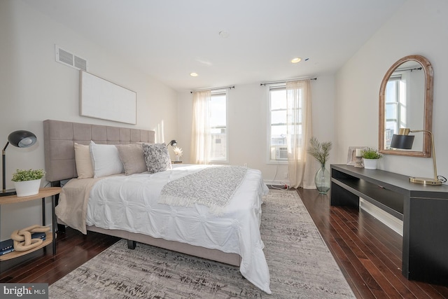 bedroom featuring dark wood-type flooring