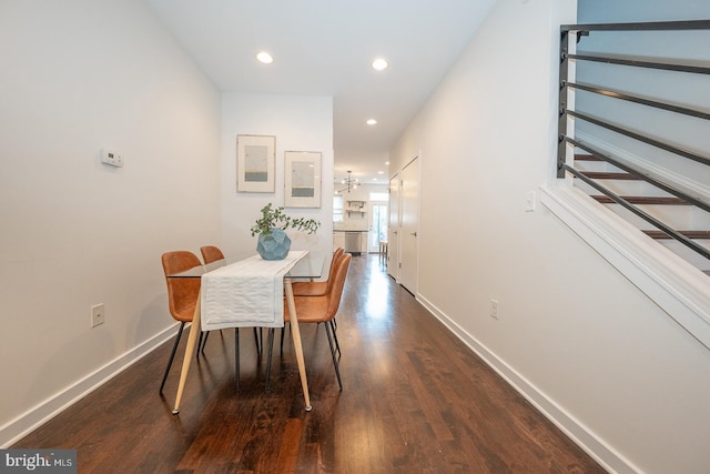 dining room with dark wood-type flooring